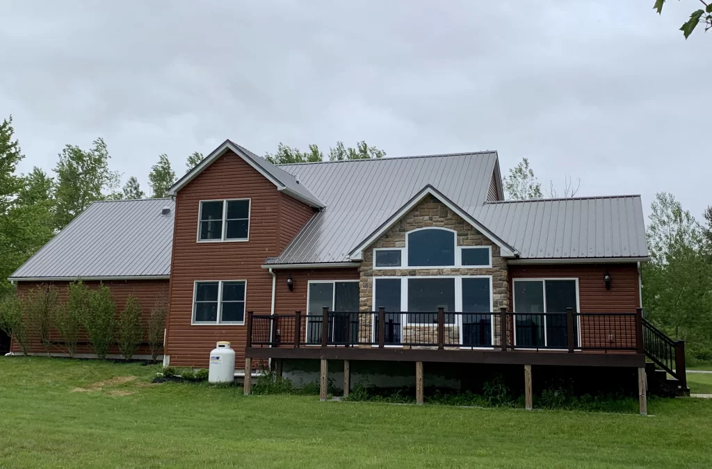 Cabin with new metal roof