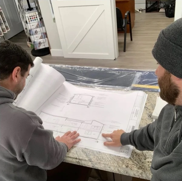 NEPA Team looking over blueprints for home remodeling and construction in Clarks Summit