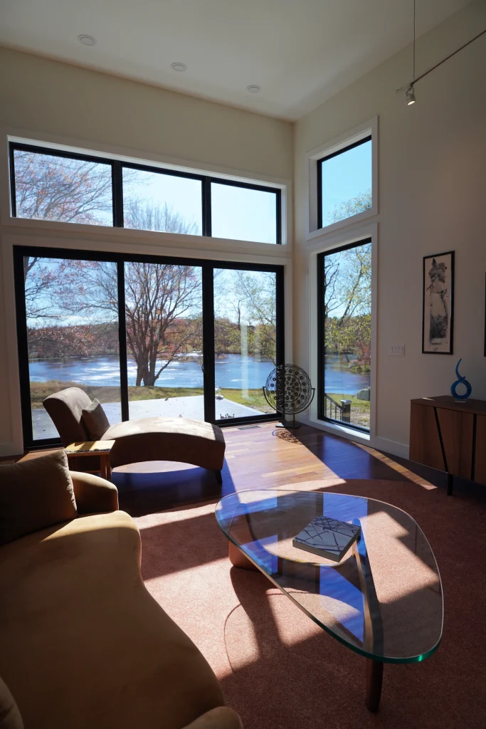 new home construction with silding door and windows off Larson Lake