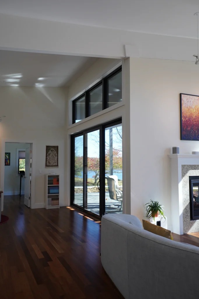 finished interior of new home construction with sliding door and windows