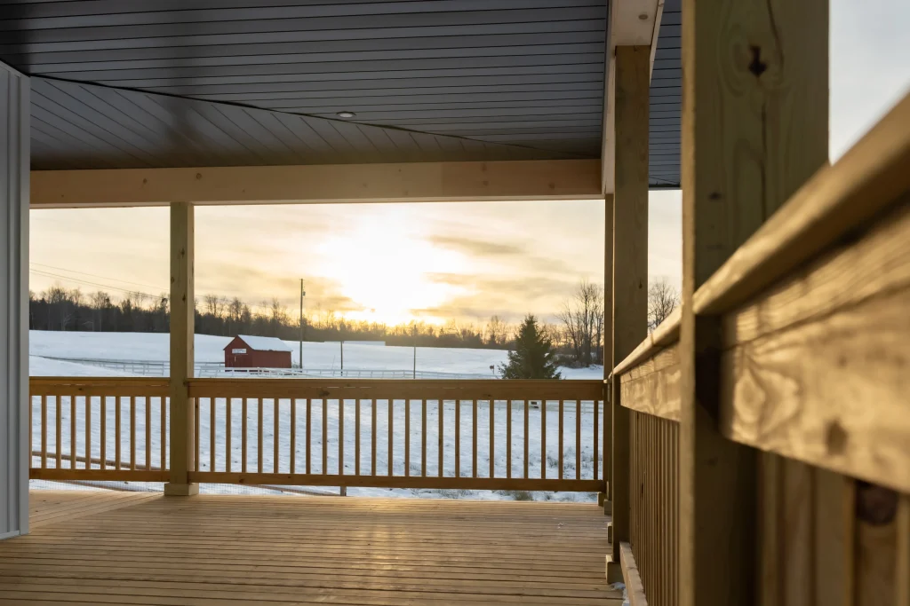 sunset beyond new home construction deck